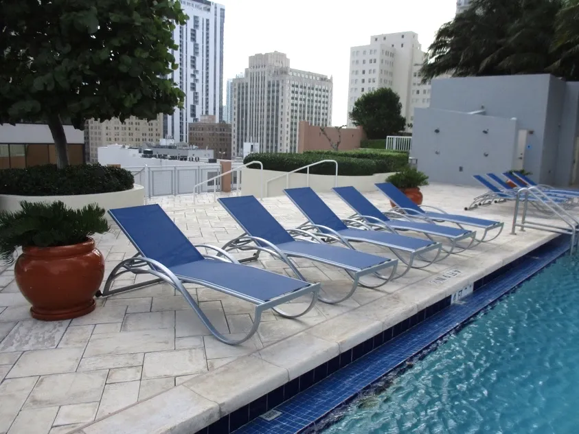 Elite Casual furniture on a commercial rooftop pool deck